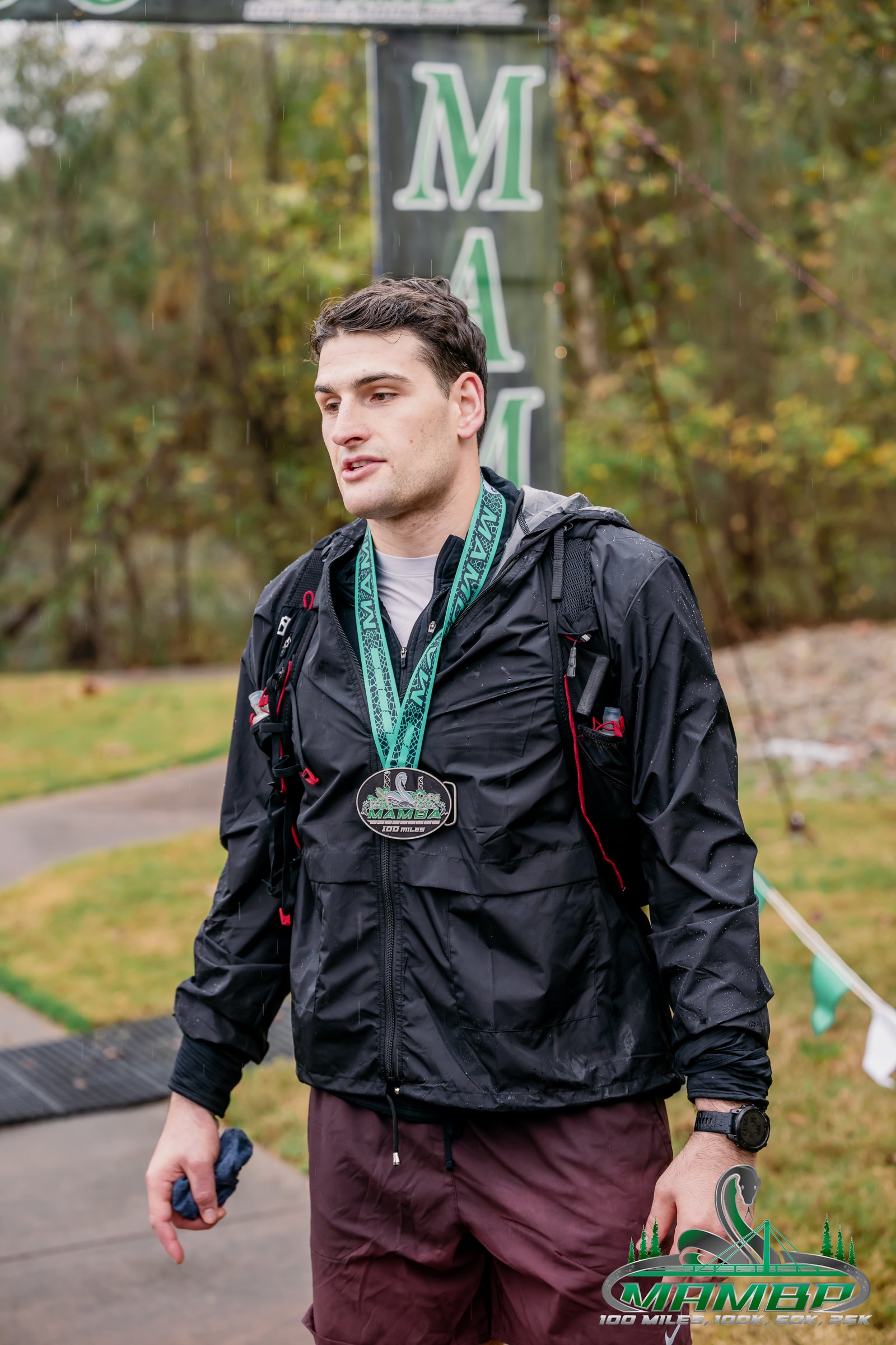 Korab Idrizi wearing his Mamba 100 finisher medal